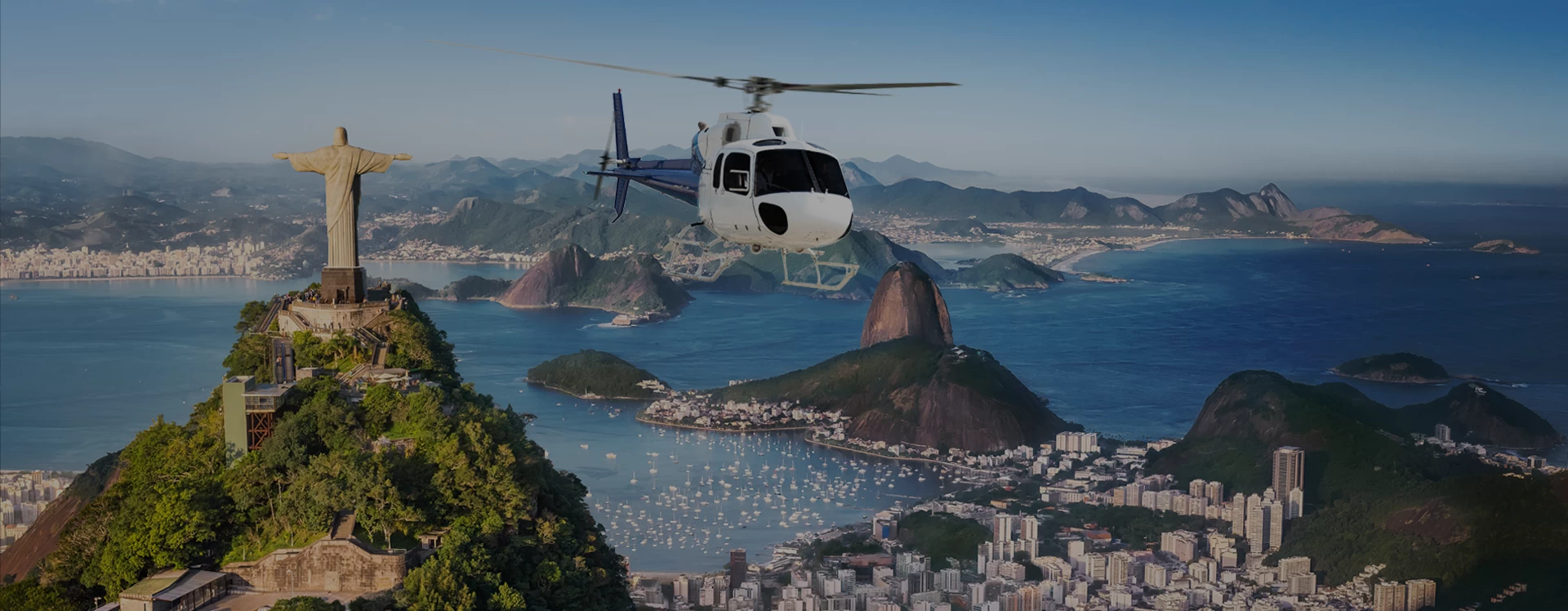 Aerial image of Rio de Janeiro highlighted in the background of the home page